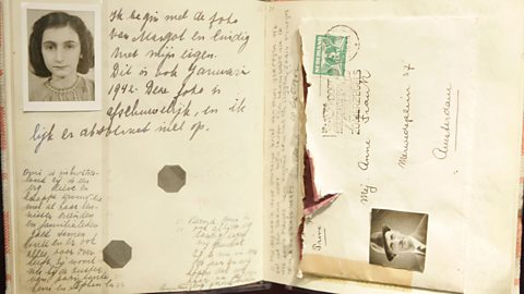 A page of Anne Frank's diary, containing her photo