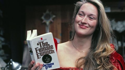 Meryl Streep holding a copy of The Female Eunuch