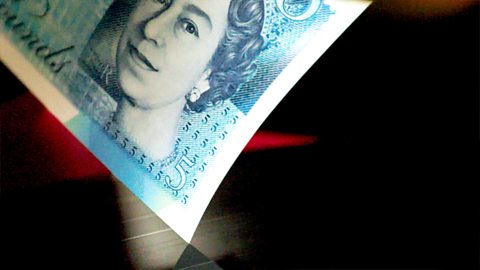 Edge of £5 note placed on record