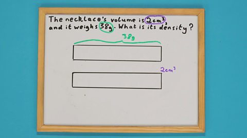 A whiteboard with two bars drawn on it