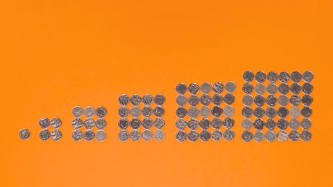 A load of coins arranged in ordered shape sizes