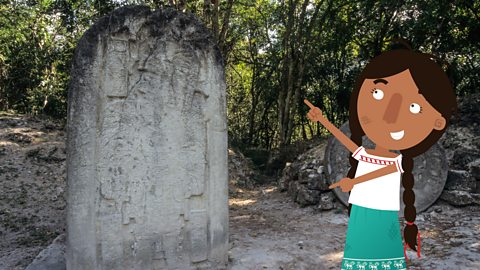 Jade pointing out a commemorative slab.