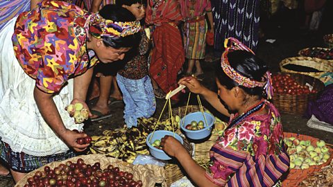 Mayas selling fruit at a market