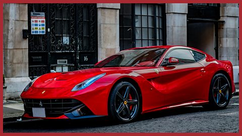 An image of a red Ferrari sports car