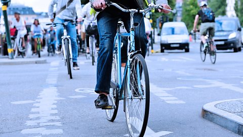 Front view of a person riding a bike