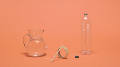 Image showing items YOU WILL NEED - An empty plastic bottle, some sticky tape, a pin, a pencil and a jug of water.