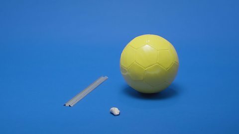 WHAT YOU NEED: A ruler, a football (approximately 22 cm) and some sticky tack.