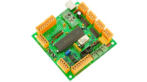 A computer numerical controlled (CNC) microcontroller based on the microchip with USB data input on a white background.