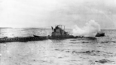 A British submarine in action in World War One, firing its gun