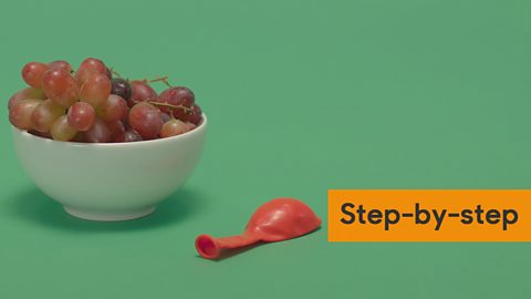A bowl of grapes, then a red balloon with the words 'step by step' to the right.