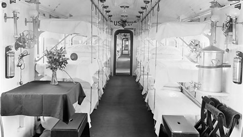 A World War One ambulance train carriage with three tiers of bunk beds