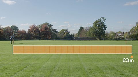 A football and ball of modelling clay are placed 23 metres apart on a football pitch.