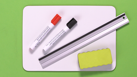 Image showing a whiteboard, pens, ruler and a board rubber