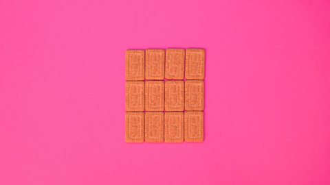 An array of 12 biscuits arranged in rows of 4 x 3.