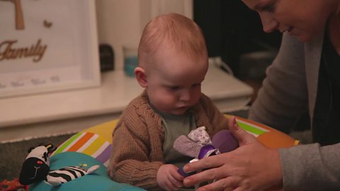 Alison talking to Austin about how the fly toy feels.