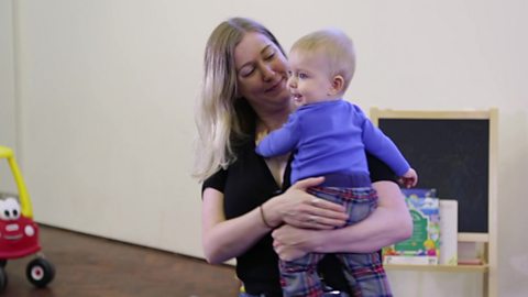 Mum dancing with her baby