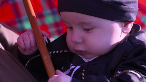 Baby under an umbrella