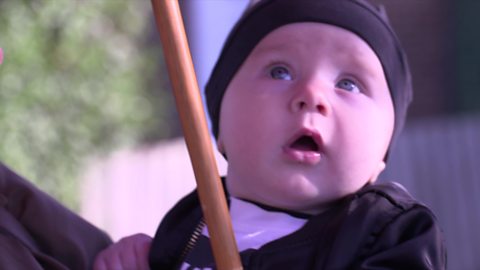 Baby under an umbrella