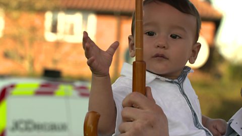 Baby under an umbrella