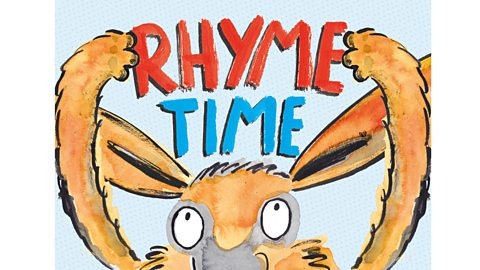 Book cover with title "Rhyme Time" held by rabbit-like creature