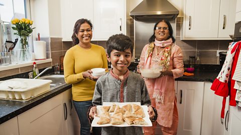 Family preparing food to break their Ramadan fast.