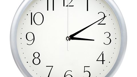 Image of a clock face showing 3.10