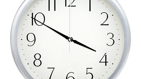 Image of a clock face showing 3.50