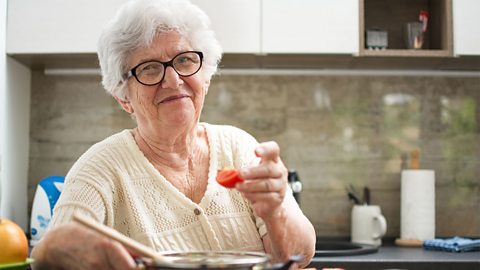 A photo of a grandmother wearing glasses