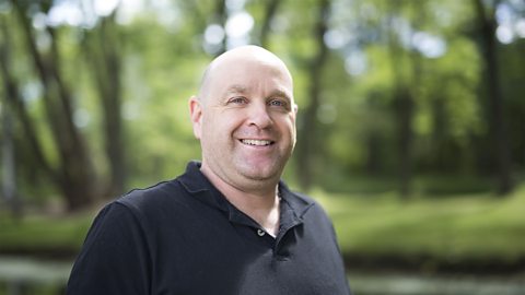 A photo of a man with a bald head