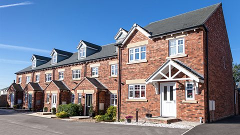 A photo of a row of houses