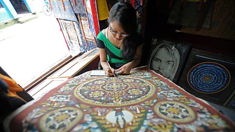 Buddhism – Painting a mandala