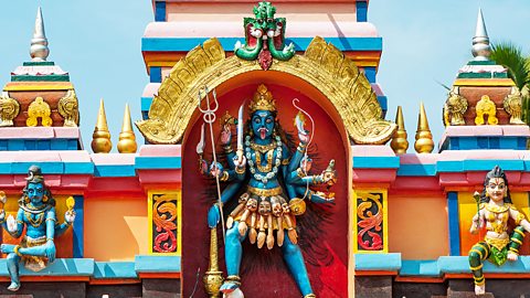 Hinduism – A statue of the goddess Kali on a temple in Kerala, India 