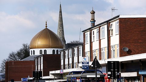 Christianity – A church and a mosque stand side by side in Birmingham