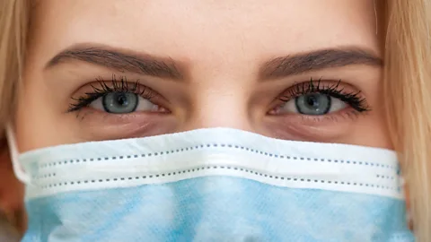 close up of eyes in face mask