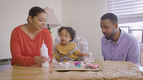 A family making a texture collage.