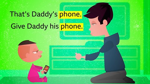 A cartoon showing a dad talking to his baby about daddy's mobile phone.