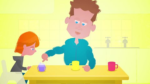 Cartoon dad sat at a table with his child. Dad is pointing out different cups. 