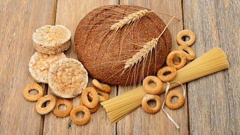 Rice cakes, a loaf of bread, biscuits and spaghetti