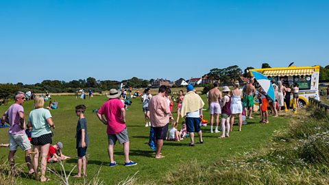 A long queue for an ice cream van