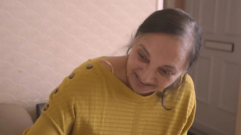 A grandmother speaking to her granddaughter.