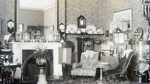 A Victorian sitting room, complete with many ornaments. 