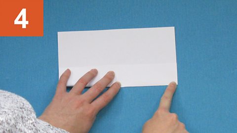 Step 4: Smoothing out the crease of a paper fold