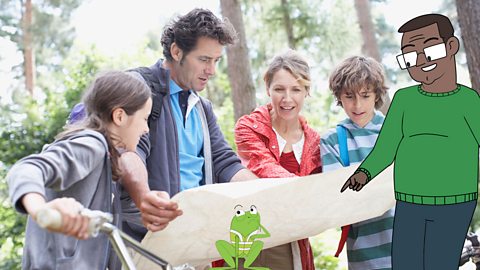 A family is looking at a map to find out where they are