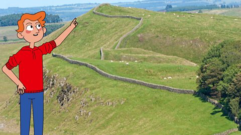 James points at the hill where Hadrian's Wall was built