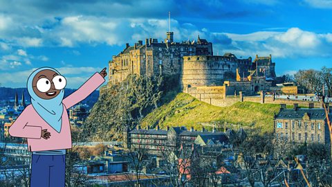 Ayesha points at Edinburgh Castle, which is an example of a human feature