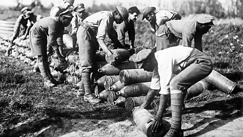 Men from the BWIR moving heavy artillery shells. 