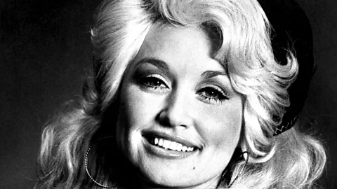Black and white close-up photograph of Dolly Parton