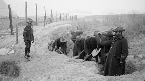 SANLC troops digging around a camp perimeter.