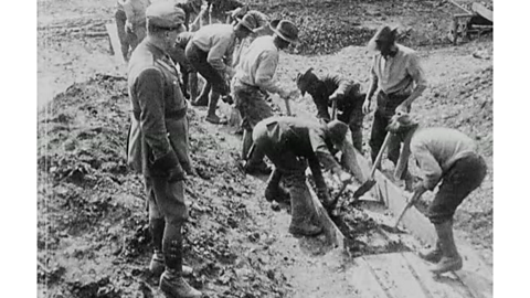 The SANLC clearing a walkway. 