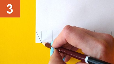 Step 3: Pencil draws a diagonal line connecting two lines on a piece of paper